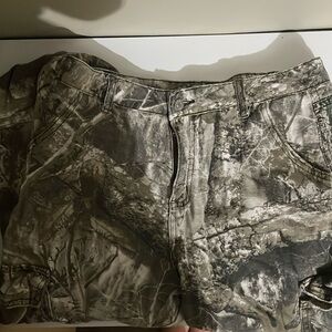 selling cargo pants. never worn. size large but they fit small